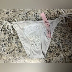 Victoria’s Secret string bikini bottom. NWT white with embroidered flowers